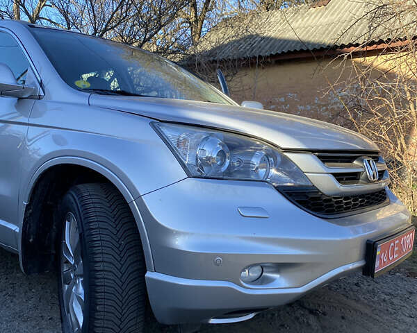 Серый Хонда СРВ, объемом двигателя 2.2 л и пробегом 238 тыс. км за 12999 $, фото 1 на Automoto.ua
