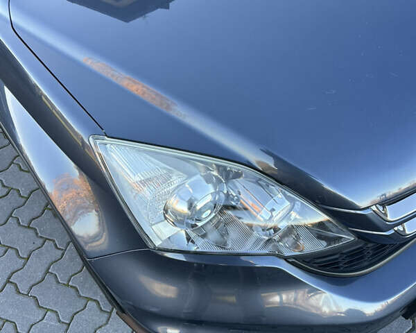 Сірий Хонда СРВ, об'ємом двигуна 2.2 л та пробігом 175 тис. км за 13999 $, фото 35 на Automoto.ua