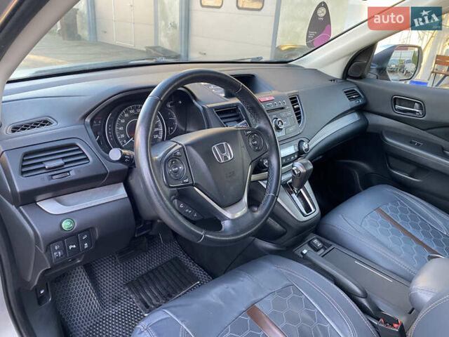 Серый Хонда СРВ, объемом двигателя 2.2 л и пробегом 216 тыс. км за 18000 $, фото 6 на Automoto.ua
