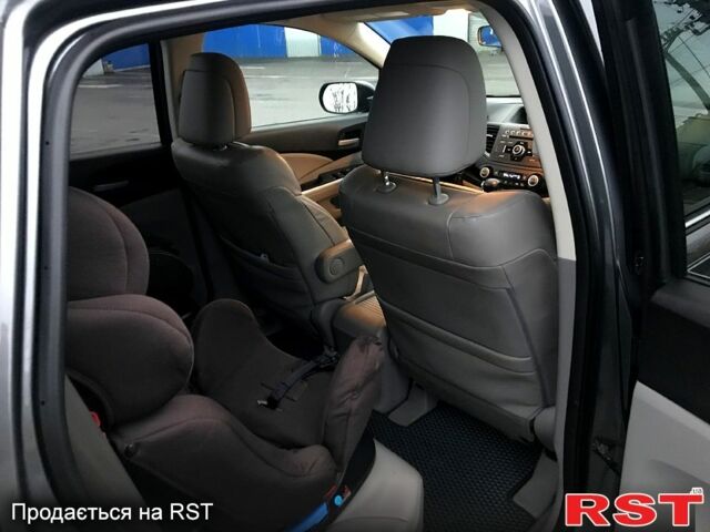 Серый Хонда СРВ, объемом двигателя 2.4 л и пробегом 135 тыс. км за 14000 $, фото 3 на Automoto.ua