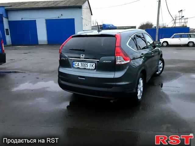 Серый Хонда СРВ, объемом двигателя 2.4 л и пробегом 135 тыс. км за 14000 $, фото 1 на Automoto.ua