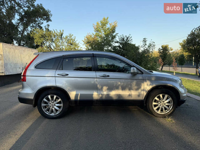 Сірий Хонда СРВ, об'ємом двигуна 2.35 л та пробігом 156 тис. км за 13000 $, фото 6 на Automoto.ua