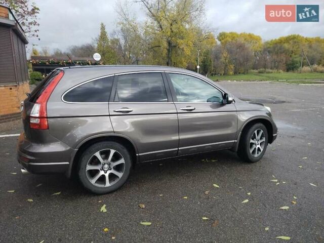 Серый Хонда СРВ, объемом двигателя 2.35 л и пробегом 250 тыс. км за 14000 $, фото 2 на Automoto.ua