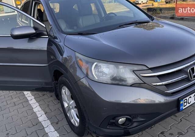 Серый Хонда СРВ, объемом двигателя 2.35 л и пробегом 253 тыс. км за 14000 $, фото 2 на Automoto.ua