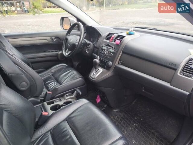 Серый Хонда СРВ, объемом двигателя 2.35 л и пробегом 250 тыс. км за 14000 $, фото 4 на Automoto.ua