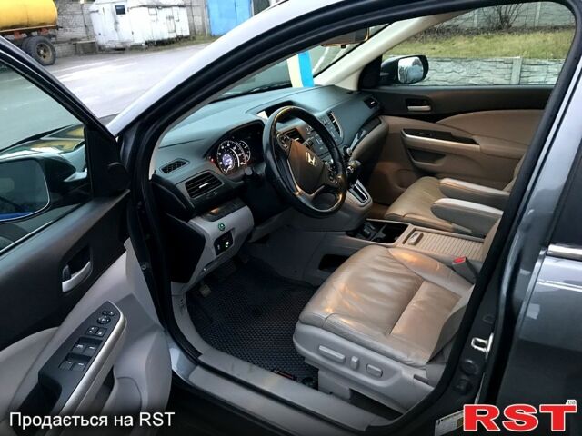 Серый Хонда СРВ, объемом двигателя 2.4 л и пробегом 135 тыс. км за 14000 $, фото 5 на Automoto.ua