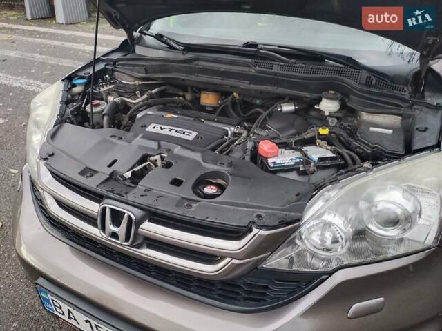 Серый Хонда СРВ, объемом двигателя 2.35 л и пробегом 250 тыс. км за 14000 $, фото 19 на Automoto.ua