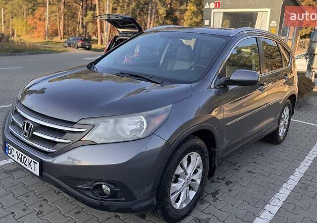 Серый Хонда СРВ, объемом двигателя 2.35 л и пробегом 253 тыс. км за 14000 $, фото 1 на Automoto.ua