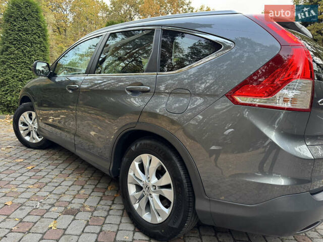 Хонда СРВ 2013 в Дрогобыче на Automoto.ua Серый Хонда СРВ, объемом двигателя 2.2 л и пробегом 228 тыс. км за 16250 $, фото 43 на Automoto.ua