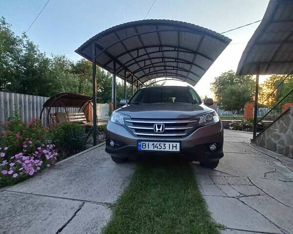 Серый Хонда СРВ, объемом двигателя 2.35 л и пробегом 181 тыс. км за 16500 $, фото 2 на Automoto.ua