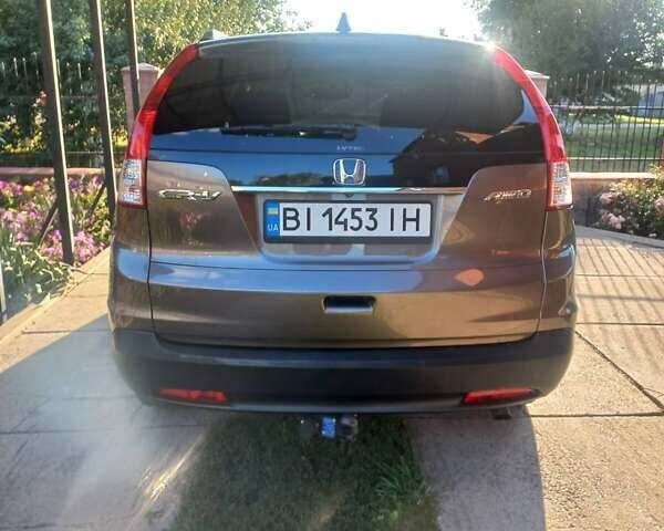 Серый Хонда СРВ, объемом двигателя 2.35 л и пробегом 181 тыс. км за 16500 $, фото 3 на Automoto.ua