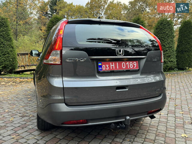 Хонда СРВ 2013 в Дрогобыче на Automoto.ua Серый Хонда СРВ, объемом двигателя 2.2 л и пробегом 228 тыс. км за 16250 $, фото 39 на Automoto.ua