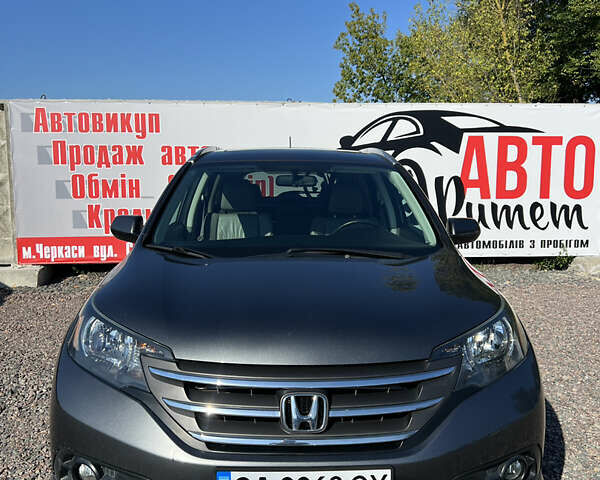 Серый Хонда СРВ, объемом двигателя 2.35 л и пробегом 101 тыс. км за 16500 $, фото 1 на Automoto.ua
