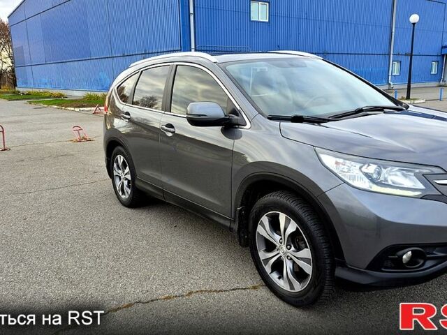 Серый Хонда СРВ, объемом двигателя 2.4 л и пробегом 170 тыс. км за 15500 $, фото 1 на Automoto.ua