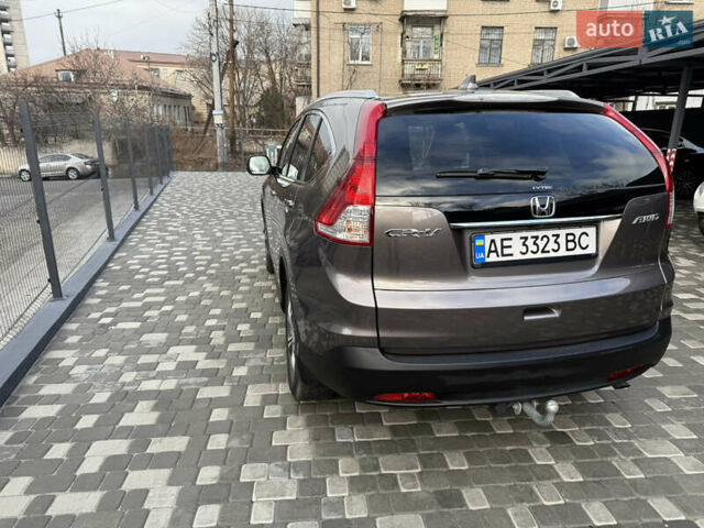 Серый Хонда СРВ, объемом двигателя 2.35 л и пробегом 128 тыс. км за 16500 $, фото 1 на Automoto.ua