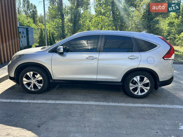 Серый Хонда СРВ, объемом двигателя 2.35 л и пробегом 121 тыс. км за 17200 $, фото 1 на Automoto.ua