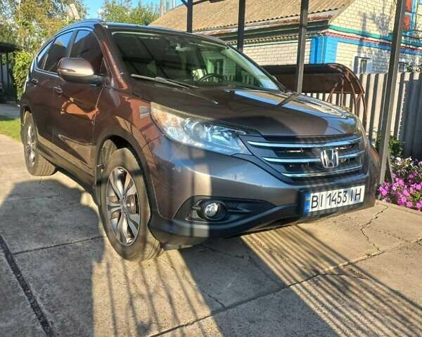 Серый Хонда СРВ, объемом двигателя 2.35 л и пробегом 181 тыс. км за 16500 $, фото 1 на Automoto.ua