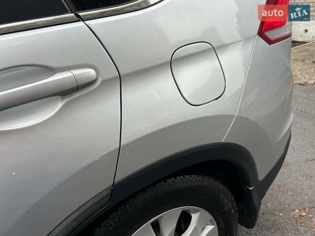 Серый Хонда СРВ, объемом двигателя 2.35 л и пробегом 213 тыс. км за 15500 $, фото 38 на Automoto.ua