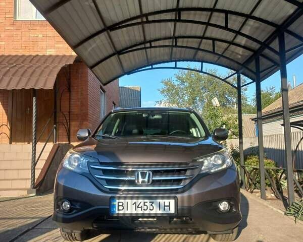 Серый Хонда СРВ, объемом двигателя 2.35 л и пробегом 181 тыс. км за 16500 $, фото 6 на Automoto.ua