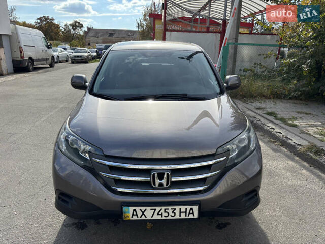 Серый Хонда СРВ, объемом двигателя 2.35 л и пробегом 205 тыс. км за 15300 $, фото 3 на Automoto.ua