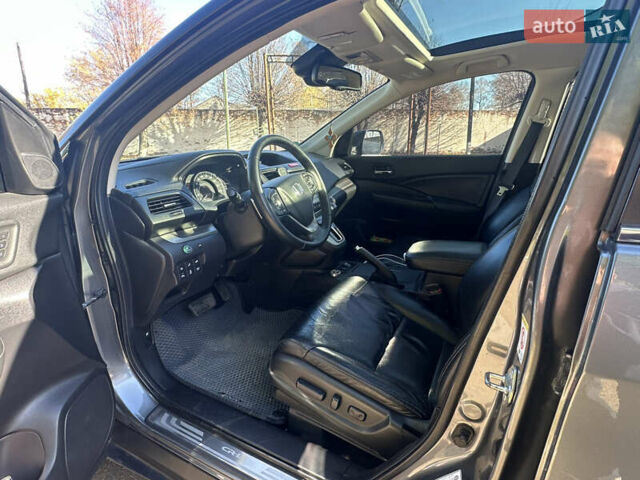 Серый Хонда СРВ, объемом двигателя 2.2 л и пробегом 167 тыс. км за 19400 $, фото 4 на Automoto.ua