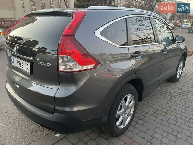 Серый Хонда СРВ, объемом двигателя 2.35 л и пробегом 162 тыс. км за 15300 $, фото 2 на Automoto.ua