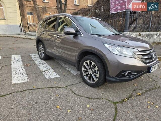 Серый Хонда СРВ, объемом двигателя 2.35 л и пробегом 83 тыс. км за 16300 $, фото 1 на Automoto.ua