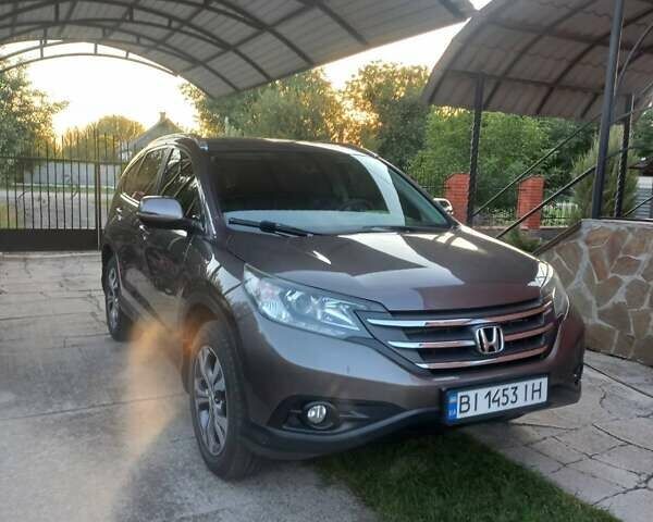 Серый Хонда СРВ, объемом двигателя 2.35 л и пробегом 181 тыс. км за 16500 $, фото 4 на Automoto.ua