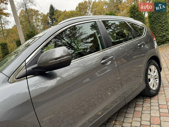 Хонда СРВ 2013 в Дрогобыче на Automoto.ua Серый Хонда СРВ, объемом двигателя 2.2 л и пробегом 228 тыс. км за 16250 $, фото 22 на Automoto.ua