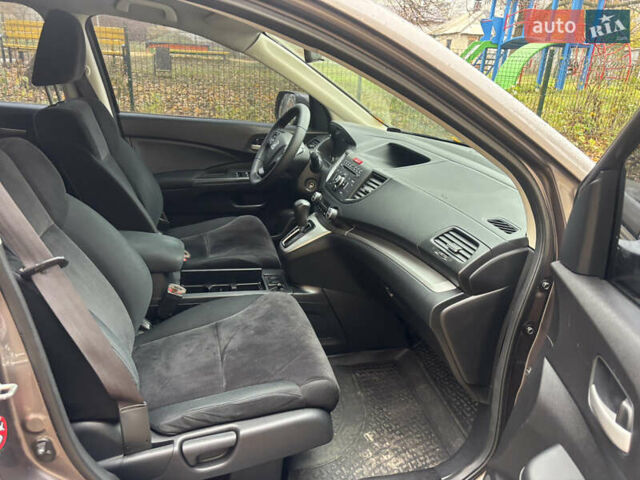 Серый Хонда СРВ, объемом двигателя 2.35 л и пробегом 205 тыс. км за 13700 $, фото 4 на Automoto.ua