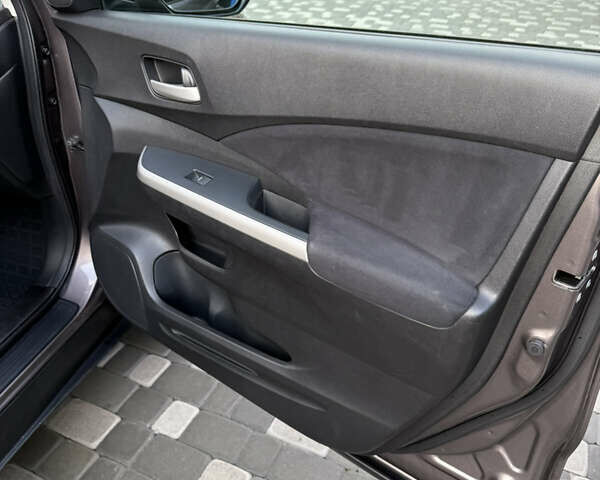 Серый Хонда СРВ, объемом двигателя 2.35 л и пробегом 128 тыс. км за 16500 $, фото 5 на Automoto.ua