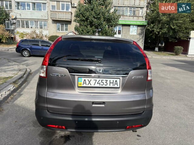 Серый Хонда СРВ, объемом двигателя 2.35 л и пробегом 205 тыс. км за 15300 $, фото 2 на Automoto.ua