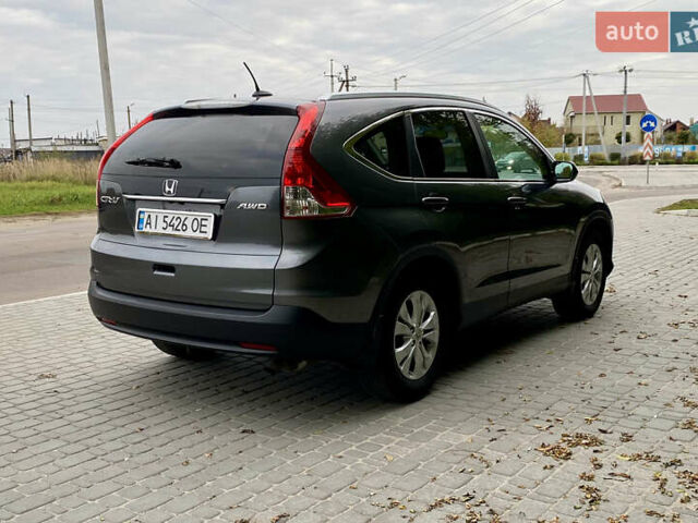 Серый Хонда СРВ, объемом двигателя 2.36 л и пробегом 194 тыс. км за 15500 $, фото 2 на Automoto.ua