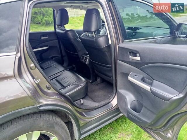 Серый Хонда СРВ, объемом двигателя 2.4 л и пробегом 195 тыс. км за 13900 $, фото 11 на Automoto.ua