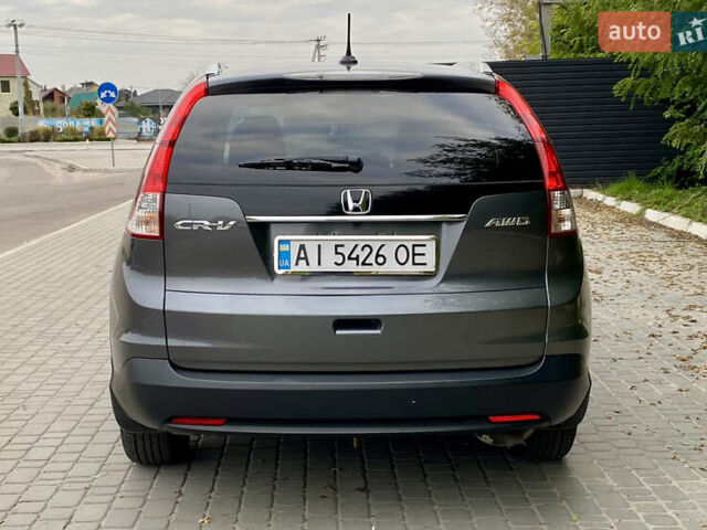 Серый Хонда СРВ, объемом двигателя 2.36 л и пробегом 194 тыс. км за 15500 $, фото 3 на Automoto.ua