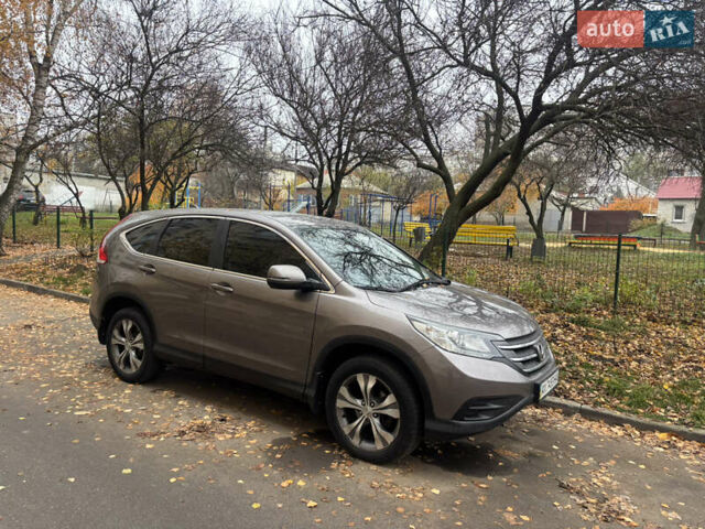 Серый Хонда СРВ, объемом двигателя 2.35 л и пробегом 205 тыс. км за 13700 $, фото 1 на Automoto.ua