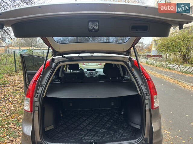 Серый Хонда СРВ, объемом двигателя 2.35 л и пробегом 205 тыс. км за 13700 $, фото 2 на Automoto.ua