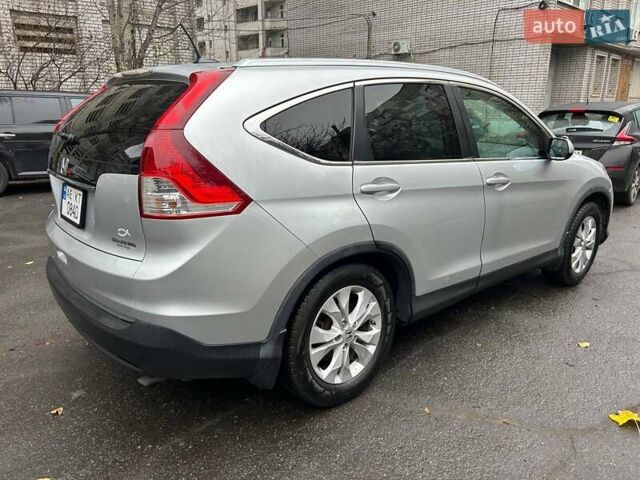 Серый Хонда СРВ, объемом двигателя 2.35 л и пробегом 213 тыс. км за 15500 $, фото 2 на Automoto.ua