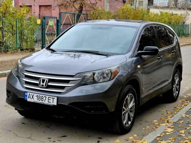Серый Хонда СРВ, объемом двигателя 2.4 л и пробегом 125 тыс. км за 14000 $, фото 1 на Automoto.ua
