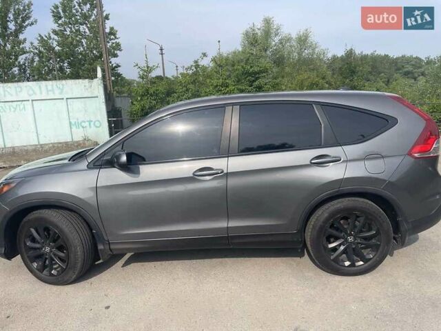 Серый Хонда СРВ, объемом двигателя 2.4 л и пробегом 158 тыс. км за 14699 $, фото 3 на Automoto.ua