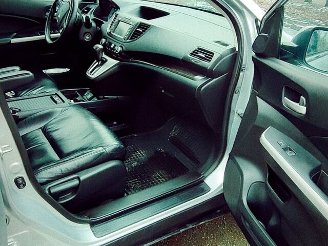Серый Хонда СРВ, объемом двигателя 2.4 л и пробегом 330 тыс. км за 15500 $, фото 1 на Automoto.ua
