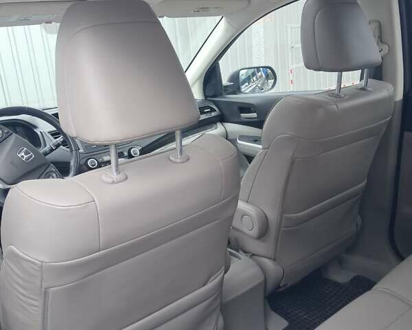 Хонда СРВ 2014 в Полтаве на Automoto.ua Серый Хонда СРВ, объемом двигателя 2.36 л и пробегом 149 тыс. км за 15500 $, фото 25 на Automoto.ua