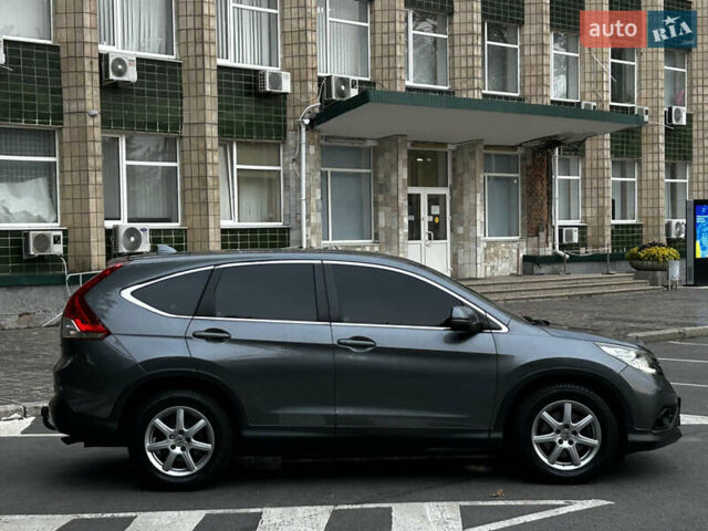 Серый Хонда СРВ, объемом двигателя 2.2 л и пробегом 205 тыс. км за 16999 $, фото 1 на Automoto.ua