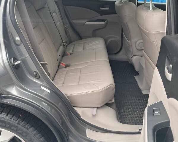Хонда СРВ 2014 в Полтаве на Automoto.ua Серый Хонда СРВ, объемом двигателя 2.36 л и пробегом 149 тыс. км за 15500 $, фото 28 на Automoto.ua