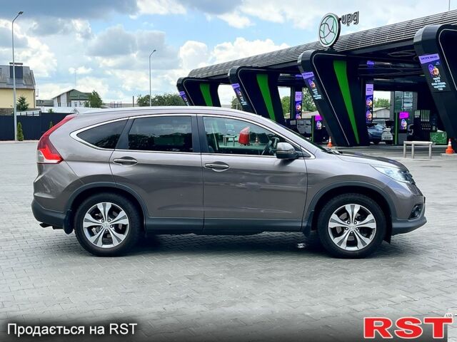 Хонда СРВ 2014 в Львове на Automoto.ua Серый Хонда СРВ, объемом двигателя 2.2 л и пробегом 185 тыс. км за 16950 $, фото 1 на Automoto.ua