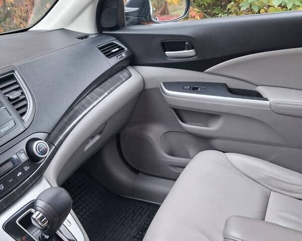 Хонда СРВ 2014 в Полтаве на Automoto.ua Серый Хонда СРВ, объемом двигателя 2.36 л и пробегом 149 тыс. км за 15500 $, фото 14 на Automoto.ua