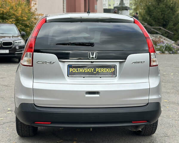 Хонда СРВ 2014 в Полтаве на Automoto.ua Серый Хонда СРВ, объемом двигателя 2.35 л и пробегом 189 тыс. км за 13500 $, фото 4 на Automoto.ua