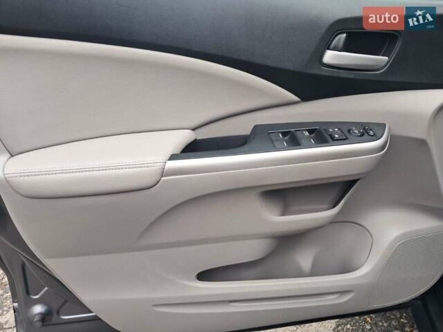 Хонда СРВ 2014 в Полтаве на Automoto.ua Серый Хонда СРВ, объемом двигателя 2.36 л и пробегом 149 тыс. км за 15500 $, фото 32 на Automoto.ua