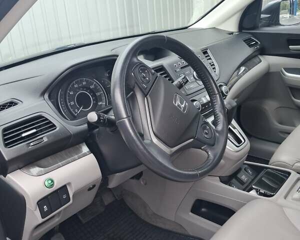 Хонда СРВ 2014 в Полтаве на Automoto.ua Серый Хонда СРВ, объемом двигателя 2.36 л и пробегом 149 тыс. км за 15500 $, фото 13 на Automoto.ua