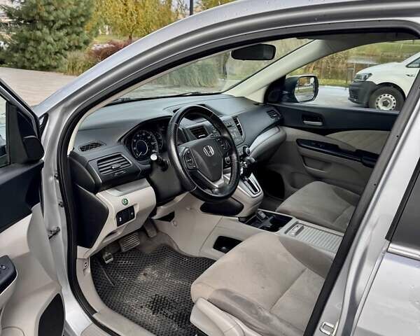 Хонда СРВ 2014 в Львове на Automoto.ua Серый Хонда СРВ, объемом двигателя 2.35 л и пробегом 170 тыс. км за 13900 $, фото 11 на Automoto.ua